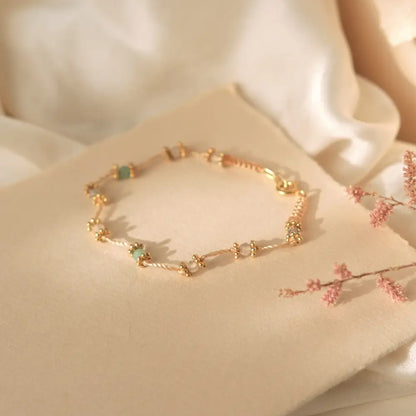 Motherhood bracelet with 9 symbolic stones