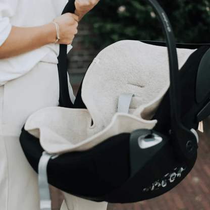 Inlägg till bilbarnstol och barnvagn i 100 % merinoull